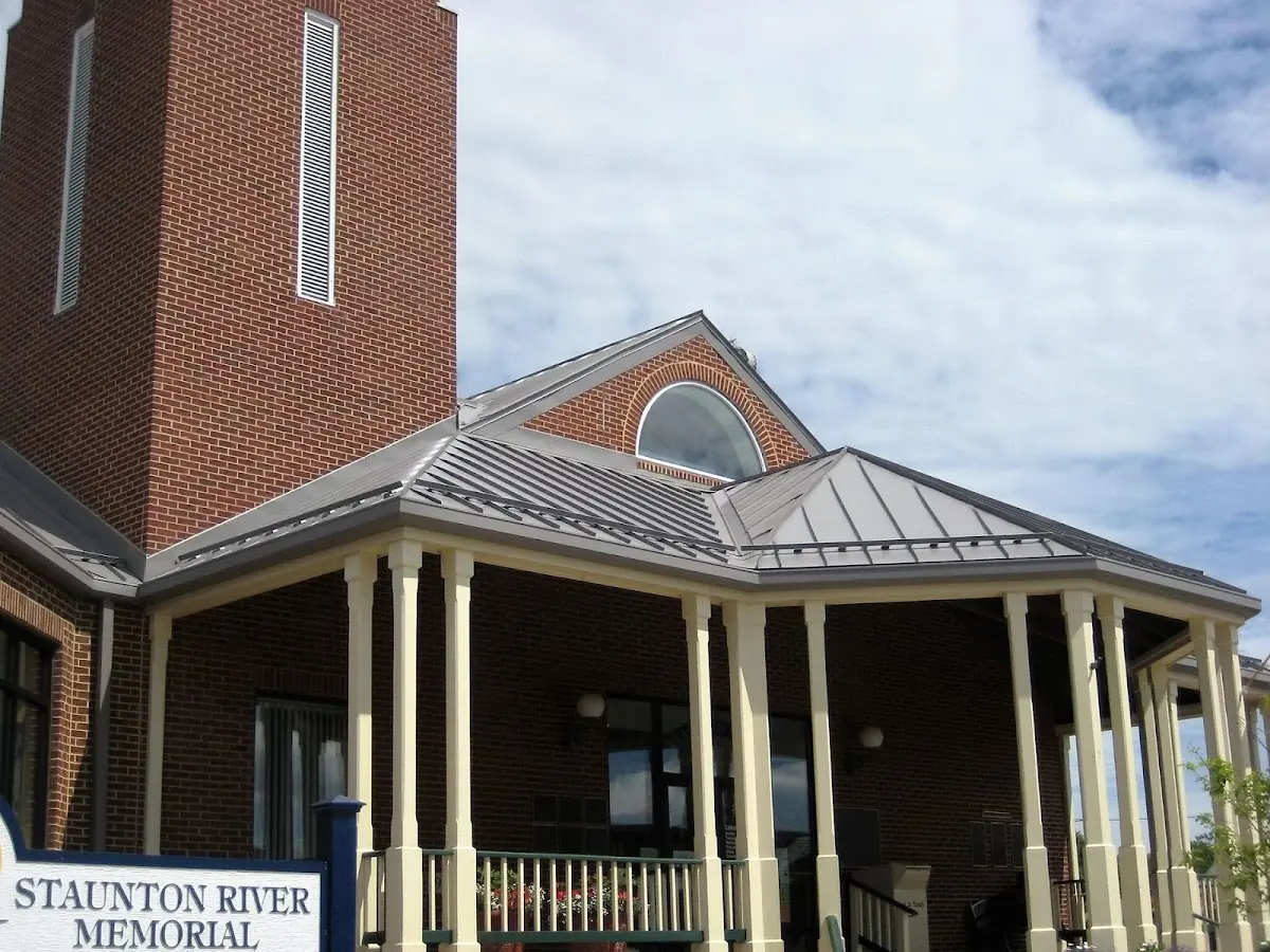 Skilled roofing craftsmen working on a residential roof in Port Reading